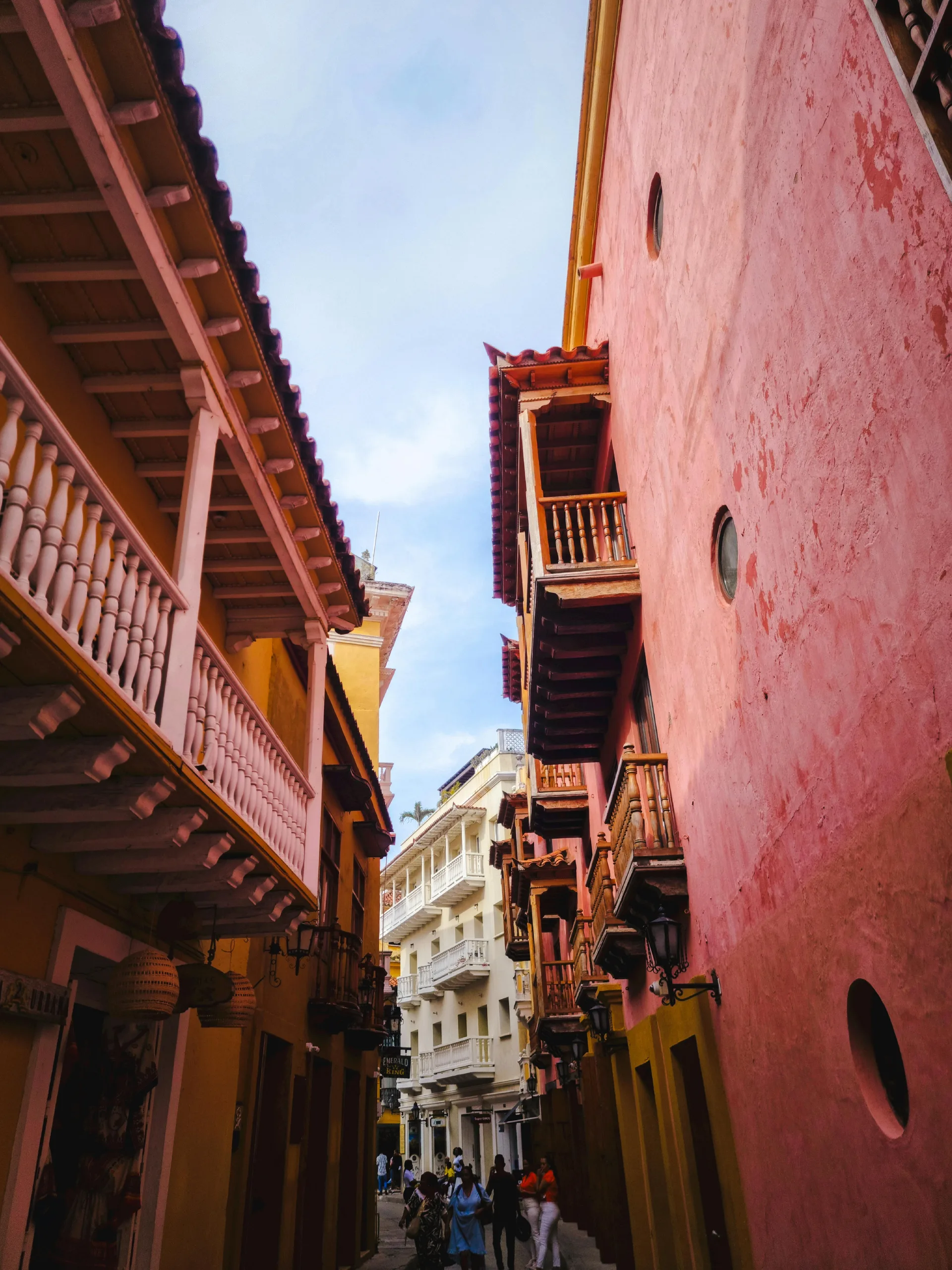 SIM Cards & Data in Cartagena: How to Get Set Up (2026) — Colorful narrow street with balconies in Cartagena, Colombia, highlighting vibra